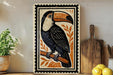 a wooden cutting board with a decorative plate featuring a colorful illustration of a toucan perched on it.