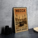 A metal sign with the text "MECCA SAUDI ARABIA" and an illustration of the Kaaba, the most sacred site in Islam, in the center.