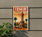 A vintage-style poster of the Izmir Tower, a famous landmark in Turkey, is displayed on a wall.