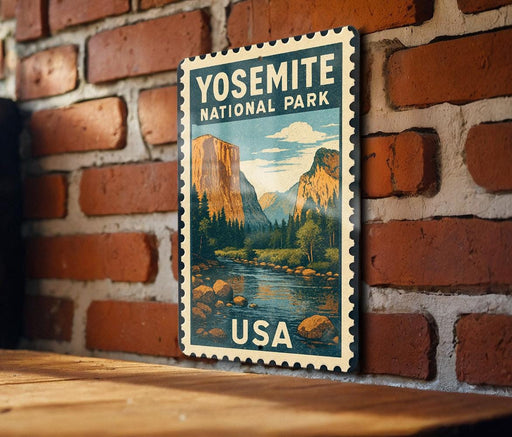 A vintage-style postage stamp depicting Yosemite National Park, featuring a scenic landscape with mountains, a river, and a wooden bench.