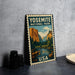 A vintage-style metal sign with the text "YOSEMITE NATIONAL PARK USA" printed on it, depicting a scenic landscape with mountains and a river.