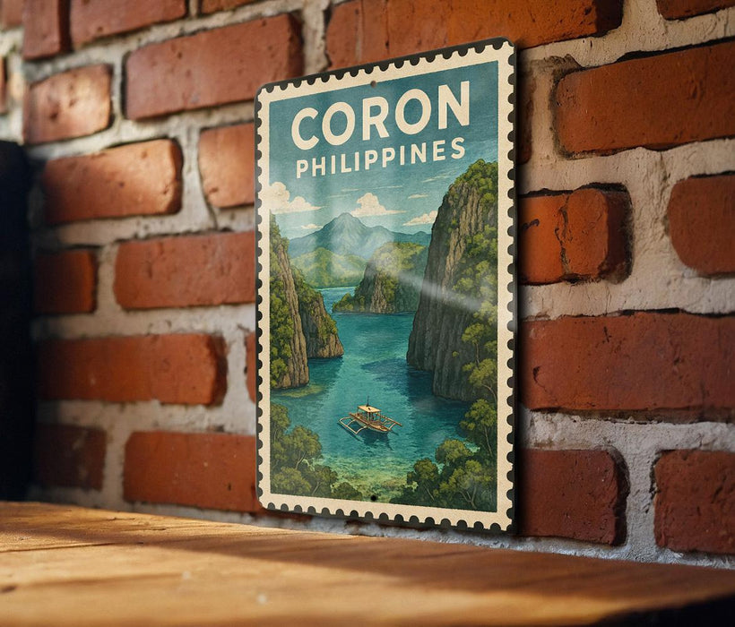 A vintage-style poster of Coron Philippines, featuring a scenic landscape with mountains, water, and a boat, is displayed on a brick wall.