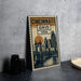 A metal sign with a cityscape illustration and the text "CINCINNATI OHIO USA" is displayed on a table.