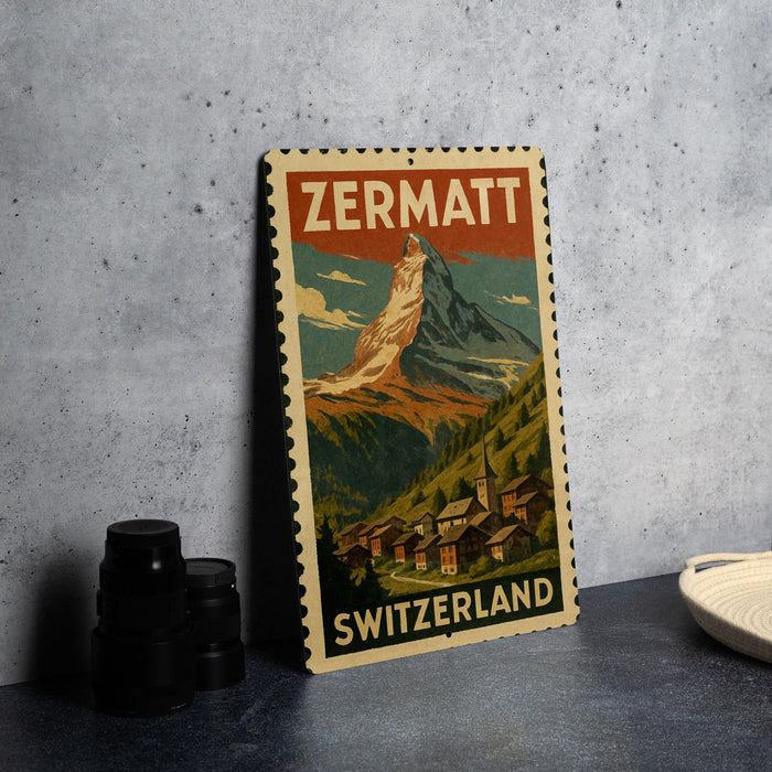A vintage-style poster of the Matterhorn mountain in Switzerland, featuring a colorful illustration of the mountain and a small village in the foreground.