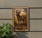a wooden sign with a deer illustration, mounted on a wall.
