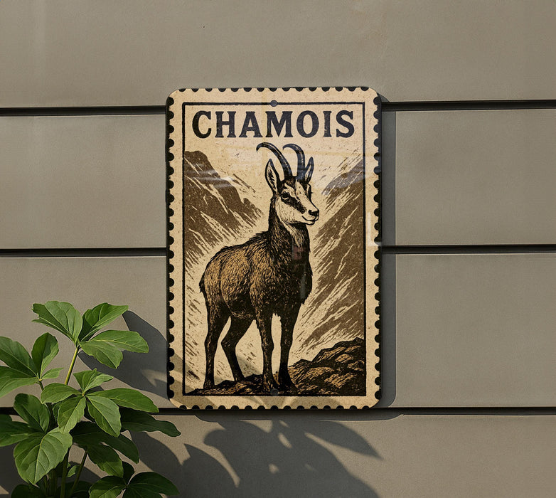 a stamp-like sign with a depiction of a mountain goat, mounted on a wall.