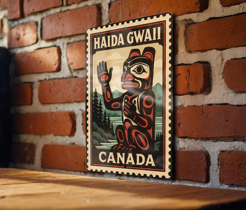 A metal sign with a red and black design hangs on a brick wall, featuring a depiction of a Native American symbol and the text "HAIDA GWALL CANADA".