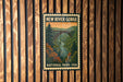 A vintage-style poster of the New River Gorge National Park in the United States, featuring a scenic landscape with a bridge and autumn foliage.