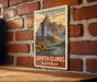 A vintage-style poster of the Lofoten Islands in Norway, featuring a mountain landscape with a small cabin in the foreground.