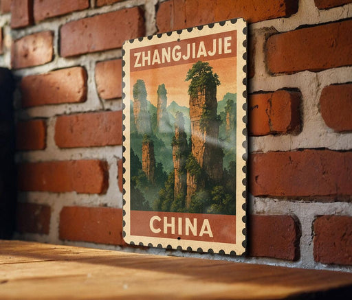 A vintage postage stamp featuring a scenic landscape of towering rock formations and lush greenery, with the text "Zhangjiajie CHINA" prominently displayed.