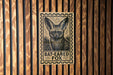 A sign featuring a bat-eared fox, with the text "BAT-EARED FOO" printed on it.