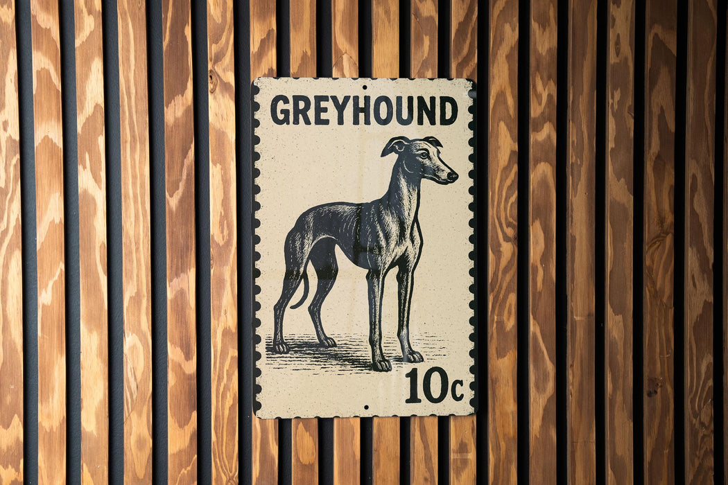 A greyhound dog is depicted on a postage stamp-like sign, mounted on a wooden wall.