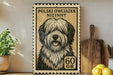 A framed image of a shaggy dog with a black and white coat, resembling a postage stamp, is displayed on a shelf next to a wooden cutting board and some lemons.