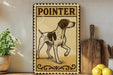 a vintage-style metal sign with the name "POINTER" and an illustration of a dog, placed on a wooden surface next to a potted plant and a wooden cutting board.