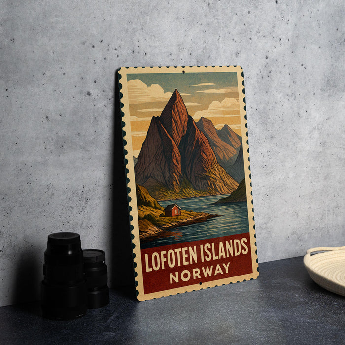 A vintage-style poster of the Lofoten Islands in Norway, featuring a mountain landscape with a small cabin in the foreground.