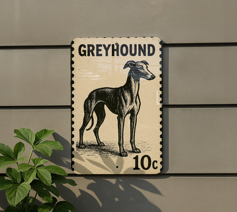 A greyhound dog is depicted on a postage stamp-like sign, mounted on a wall.