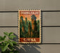 A vintage postage stamp depicting the famous rock formations of the Banjo Mountains in China, with the text "Zhangjiajie CHINA" prominently displayed.