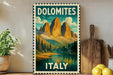 A vintage-style poster of Dolomites, a famous mountain range in Italy, displayed on a wall next to a wooden cutting board and some potted plants.
