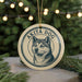 A circular ornament featuring a close-up of a husky dog's face, with the text "AKITA DOG" prominently displayed.