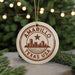 A circular ornament with the text "AMARILLO TEXAS USA" printed on it, featuring a silhouette of a city skyline.