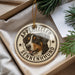A decorative ornament featuring a close-up image of a dog's face, with the text "APENNZELER SENNENHUND" around the image.