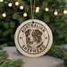 A circular ornament featuring an illustration of an Australian Shepherd dog, with the text "AUSTRALIAN SHEPHERD" printed on it.