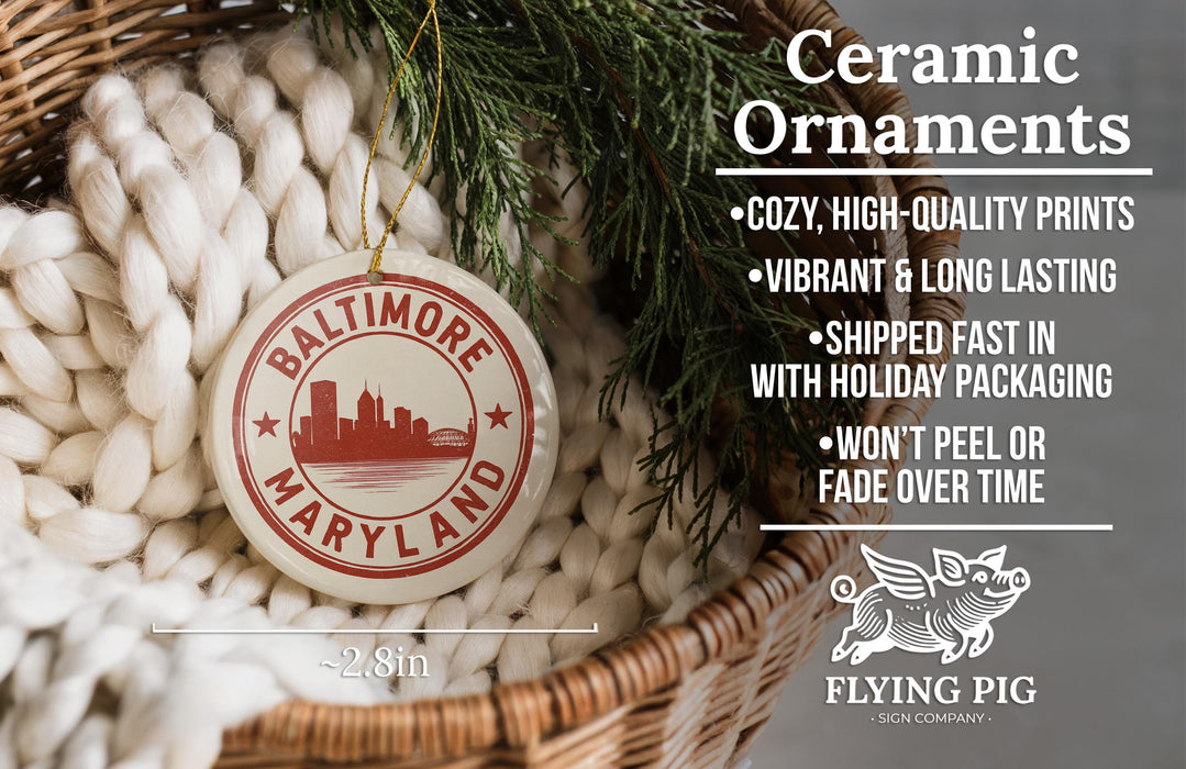 Ceramic ornaments, featuring a Baltimore, Maryland cityscape, are displayed in a wicker basket.