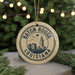 A circular ornament with the text "BATON ROUGE LOUISIANA" and a graphic of a city skyline.