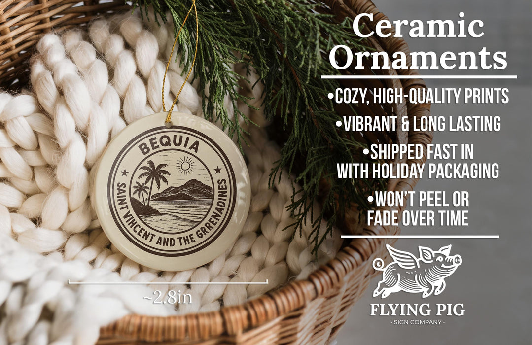Ceramic ornaments, including a round ornament with a palm tree and mountain design, are displayed in a woven basket.