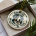 A decorative ornament featuring a Bernese Mountain Dog, with the text "BERNESE MOUNTAIN DOG" printed on it.
