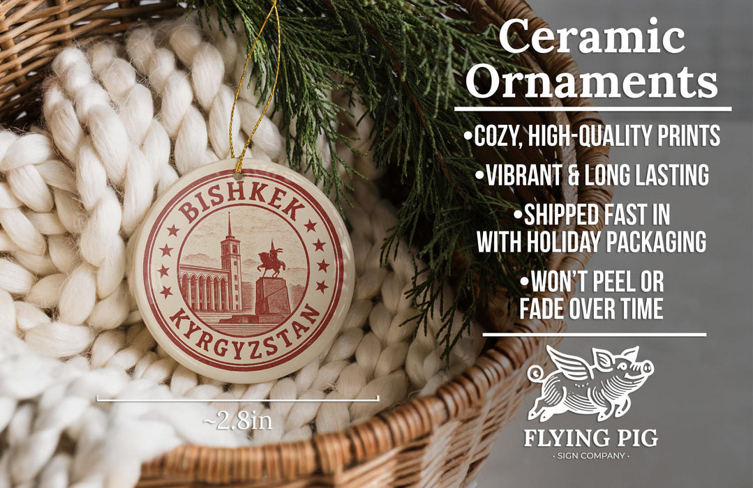 Ceramic ornaments, including a Bishkek ornament, are displayed in a woven basket.