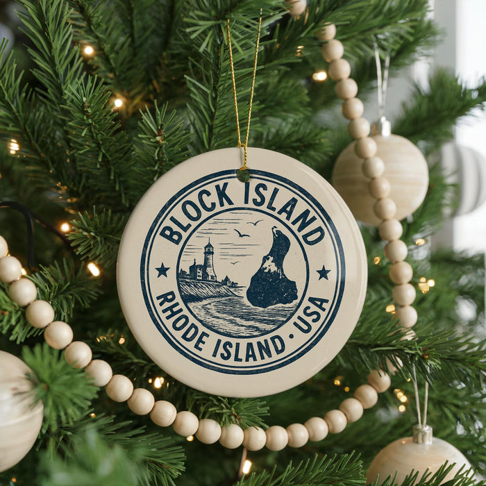 A Christmas tree decorated with ornaments, including a circular ornament with the text "BLOCK ISLAND RHODE ISLAND USA" and a lighthouse image.