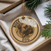 A circular ornament with a boerboel dog image and the text "Boerboel Dog" is displayed in a box, surrounded by pine branches.