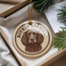A round ornament featuring a brown and white illustration of a Boykin Spaniel dog, with the text "BOYKIN SPANIEL" printed on it.