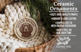 Ceramic ornaments featuring a Borkin Spaniel dog, with a wicker basket and greenery in the background.