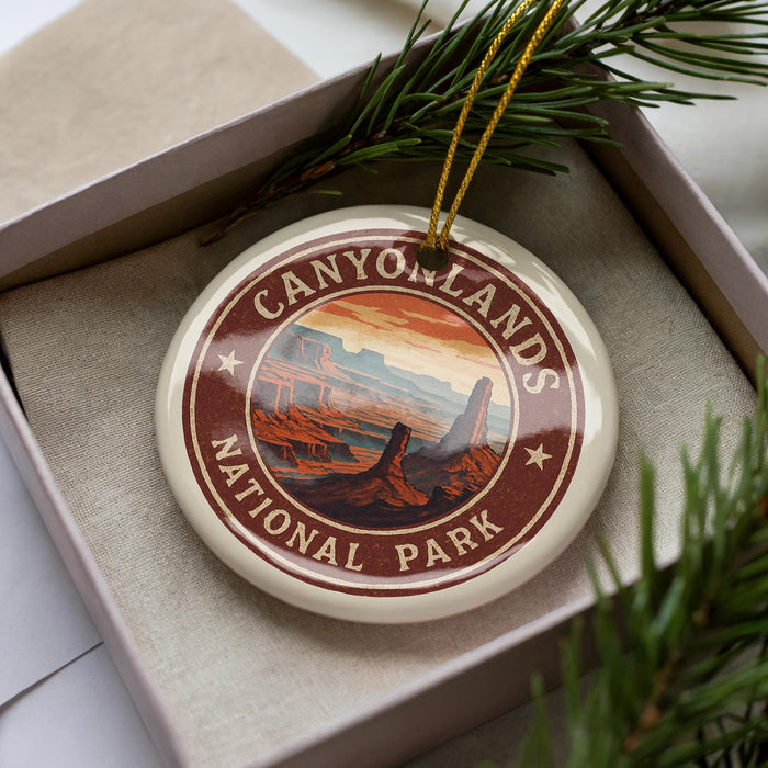 A decorative ornament featuring a scenic image of the Grand Canyon National Park, with the text "CANYONLANDS NATIONAL PARK" prominently displayed.