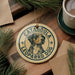 A round ornament featuring a leopard dog, with the text "CATAHOULA LEOPARD DOG" printed on it.