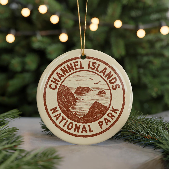 A circular ornament with the text "Channel Islands National Park" printed on it, hanging from a string.