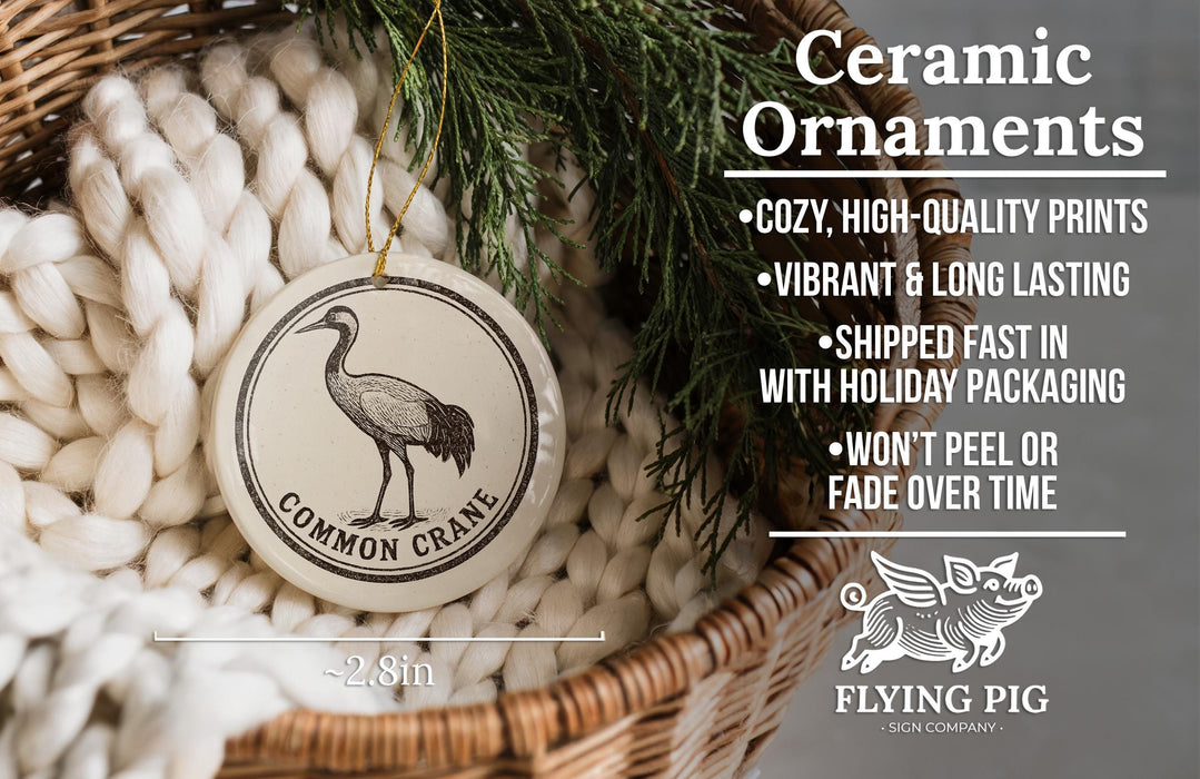 a ceramic ornament hanging from a wicker basket, with a bird and a pig design. The ornament is described as a " Ceramic Ornaments" and is described as "Cozy, High-quality Prints" and "Vibrant & Long Lasting". It is also noted that the ornament is "Shipped Fast in with Holiday Packaging" and " Won't Peel or Fade Over Time". The image is a part of a larger collection of images, and the caption is a "Flying Pig - SIGN COMPANY".