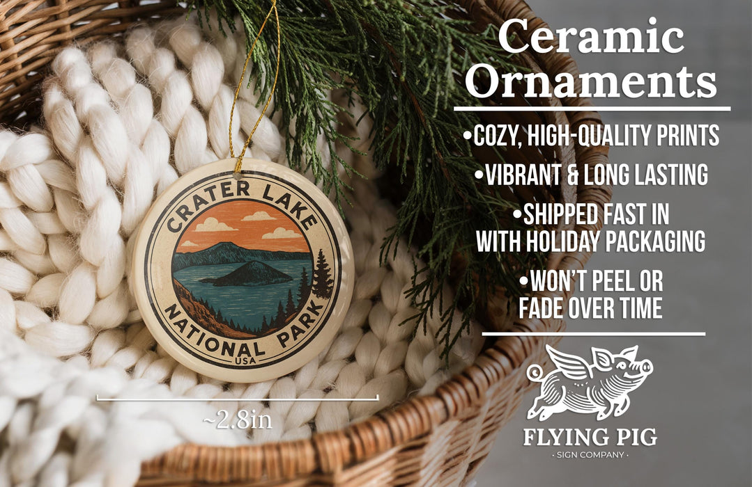 Ceramic ornaments, featuring a Crater Lake National Park ornament, are displayed in a woven basket.