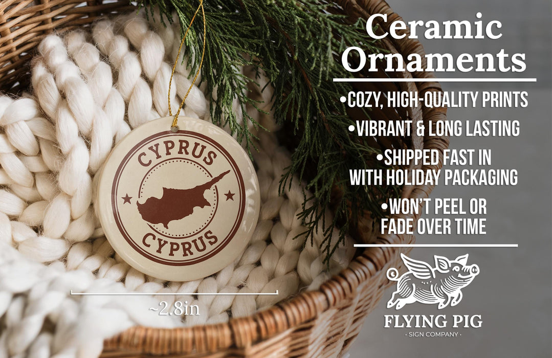 Ceramic ornaments, including a Cyprus ornament, are displayed in a woven basket.