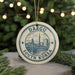 A circular ornament with the text "DAENGU SOUTH KOREA" and an illustration of a cityscape, hanging from a string.