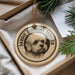 A decorative ornament featuring a dandie dinmont terrier dog, with the text "DANDIE DINMONT TERRIER" printed on it.