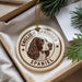 A round ornament featuring an English Springer Spaniel dog's head, with the text "English Springer Spaniel" around the edge.