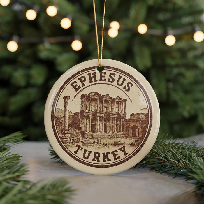 A circular ornament with the text "EPHESUS TURKEY" and an illustration of the ancient city of Ephesus, Turkey, hanging from a string.