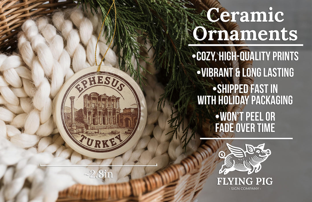 Ceramic ornaments, featuring a round ornament with an image of the Ephesus Temple in Turkey, hanging from a wicker basket.