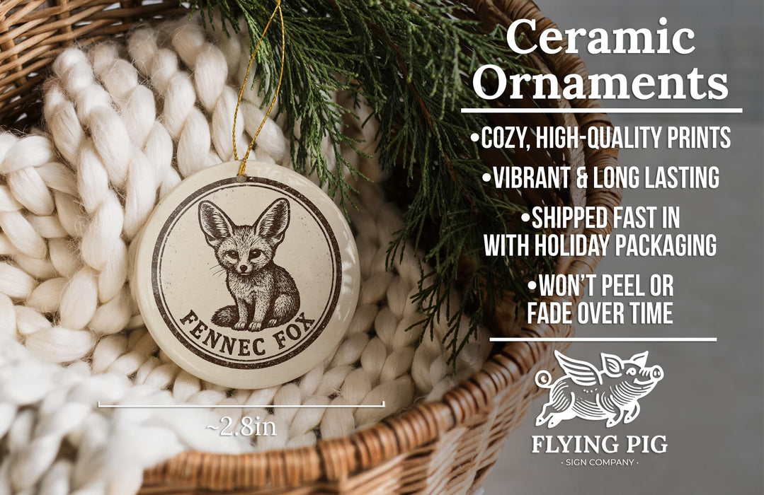 Ceramic ornaments featuring a ceramic fox, with text describing the ornaments as "cozy, high-quality prints, vibrant and long lasting, shipped fast in with holiday packaging, won't peel or fade over time" and the size of the ornament as "-2.8in".