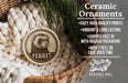Ceramic ornaments featuring a ferret image, with a wicker basket and greenery in the background.