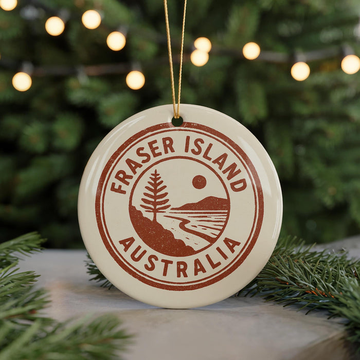 A circular ornament with the text "FASTER ISLAND AUSTRALIA" printed on it, hanging from a string.