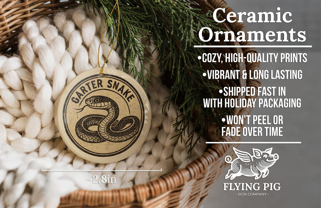 Ceramic ornaments, specifically a ceramic snake ornament, are displayed in a woven basket.